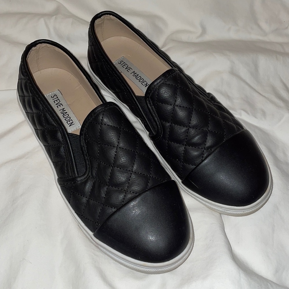 black Steve Madden slip-ons